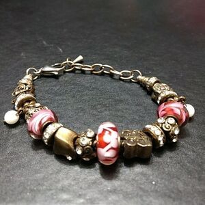 Gold tone pink bead charm bracelet up to 7.5"